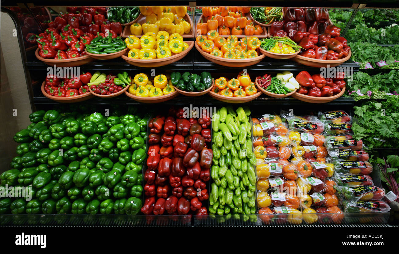 Rows of Peppers and Produce in a Large Supermarket Stock Photo