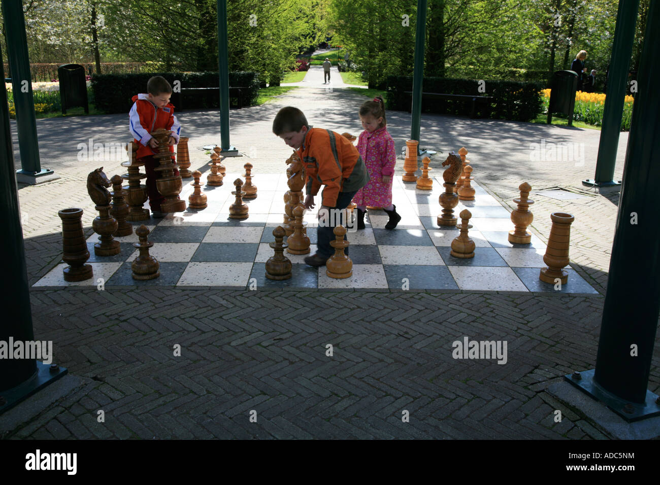 Keukenhof Gardens in Lisse, Holland;Netherlands children playing chess Stock Photo