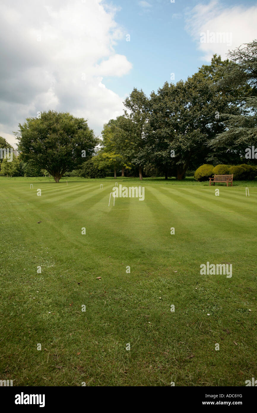 English Croquet lawn at West Dean Gardens, West Sussex, England, UK Stock Photo