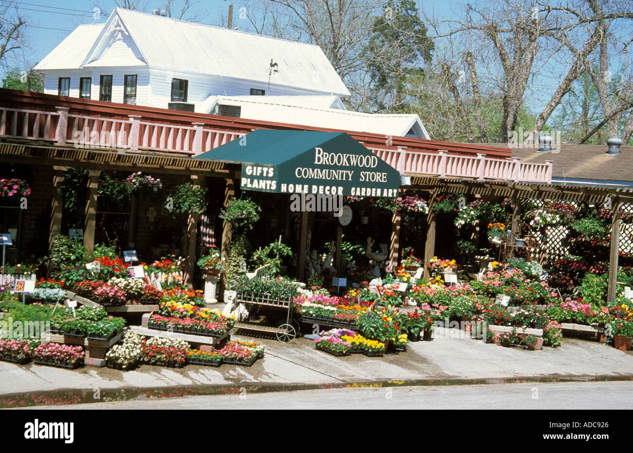 Old Town Spring Texas USA Store with flowers outside Stock Photo Alamy