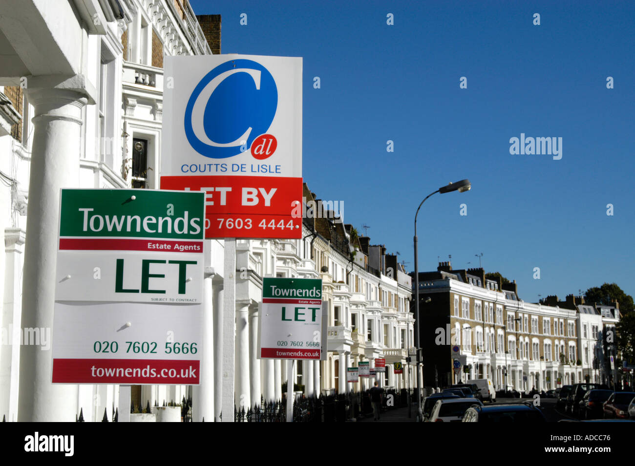 To Let property signs in residential street, London England UK Stock Photo