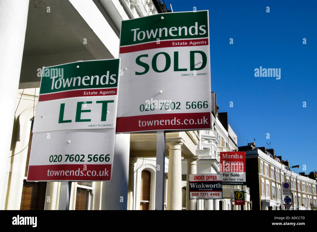 To Let and For Sale property signs in residential street, London England Britain UK Stock Photo