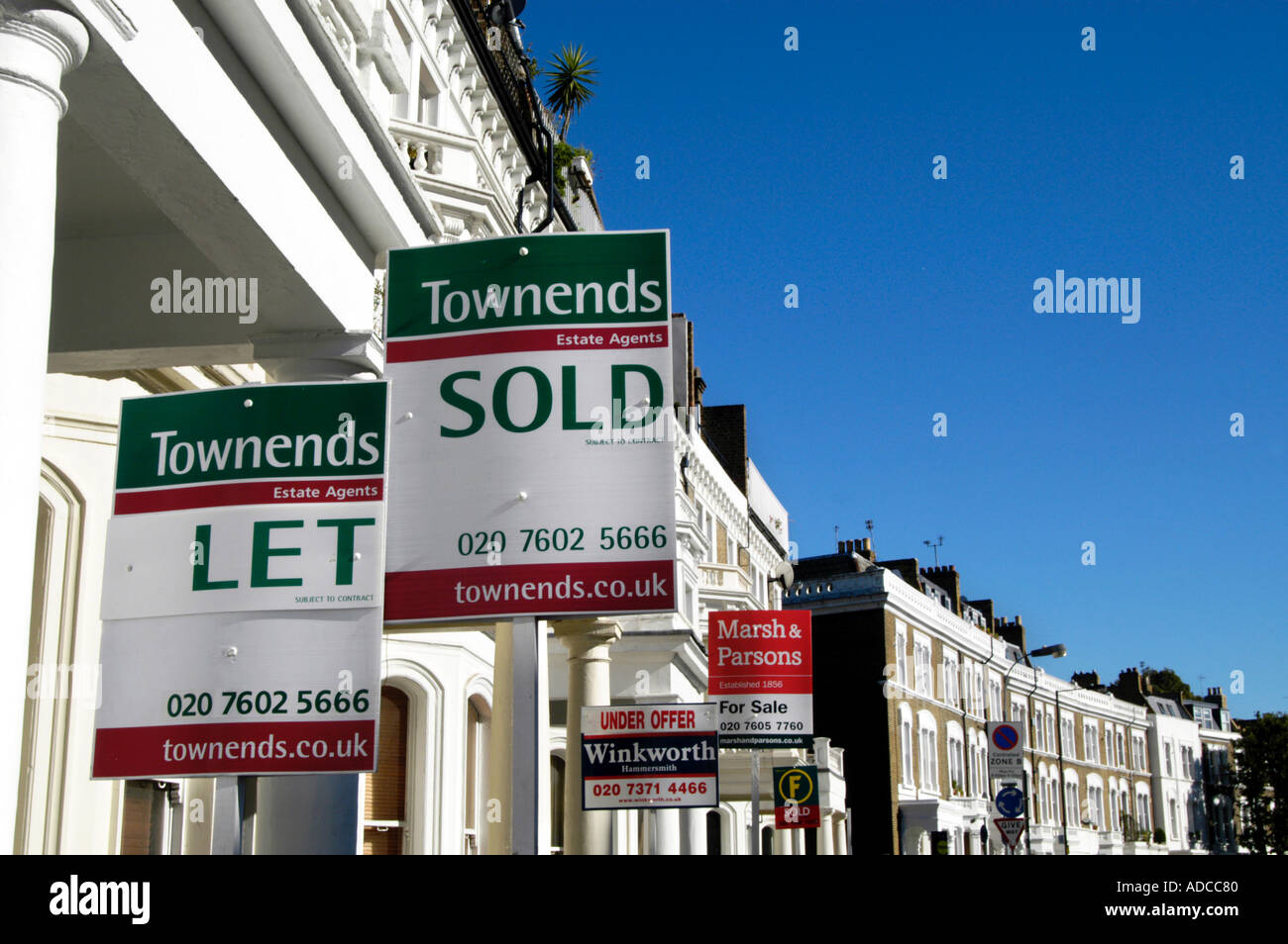 To Let and For Sale property signs in residential street, London, England, UK Stock Photo