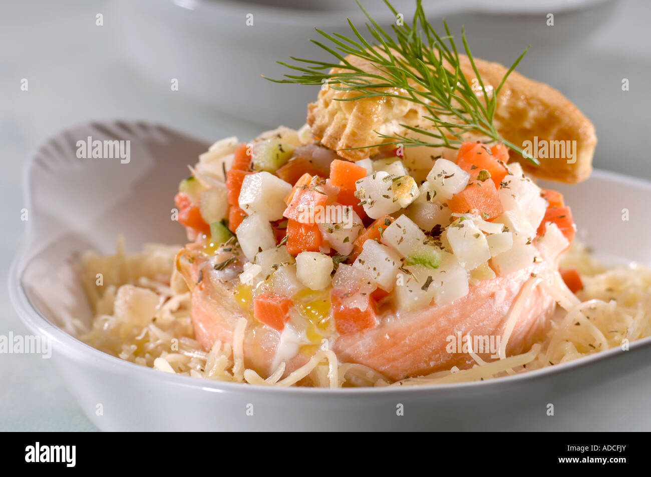 Poached salmon with diced vegetables Stock Photo Alamy