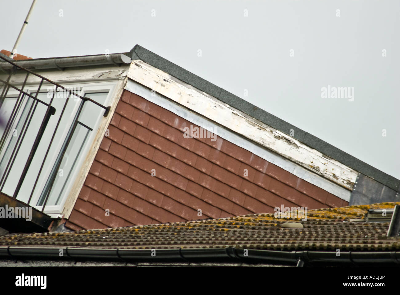 BADLY REPAIRED DORMA ROOF Stock Photo