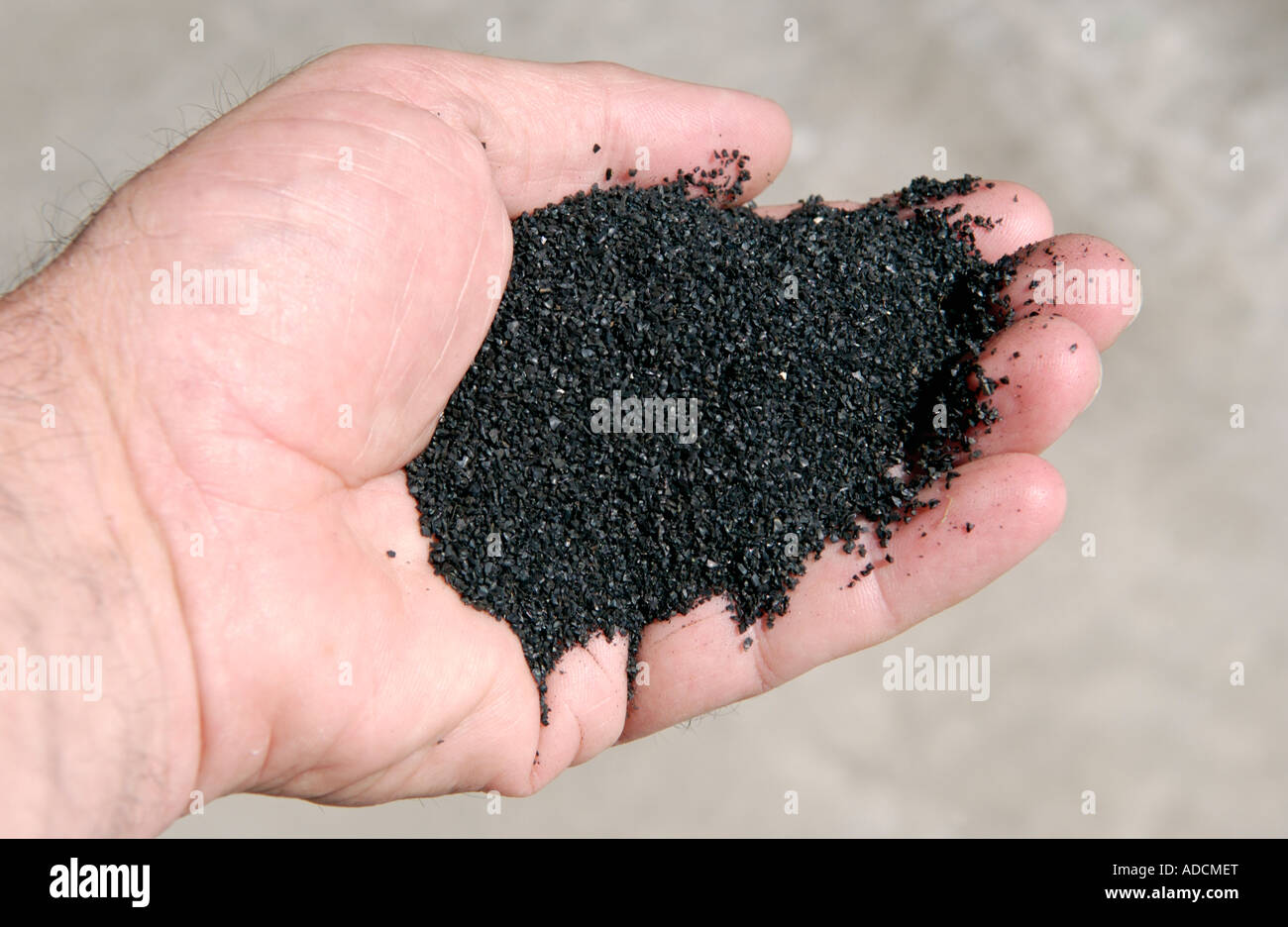Rubber crumb made at TyreGenics cryogenic tyre recycling plant Baglan South  Wales UK Stock Photo - Alamy