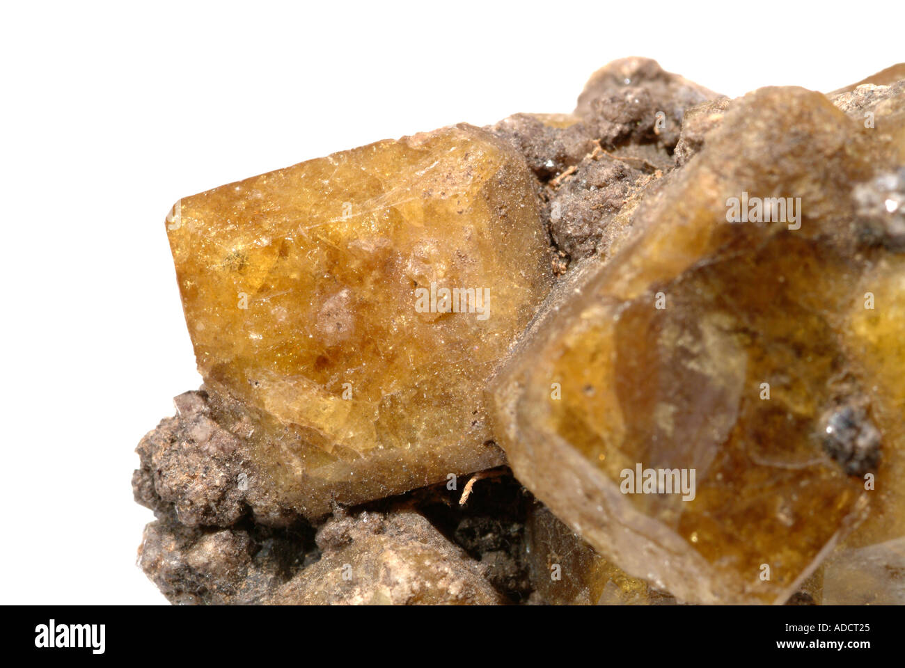 Mineral Vesuvianite, interlocking oblong crystals, Amberbrown colour