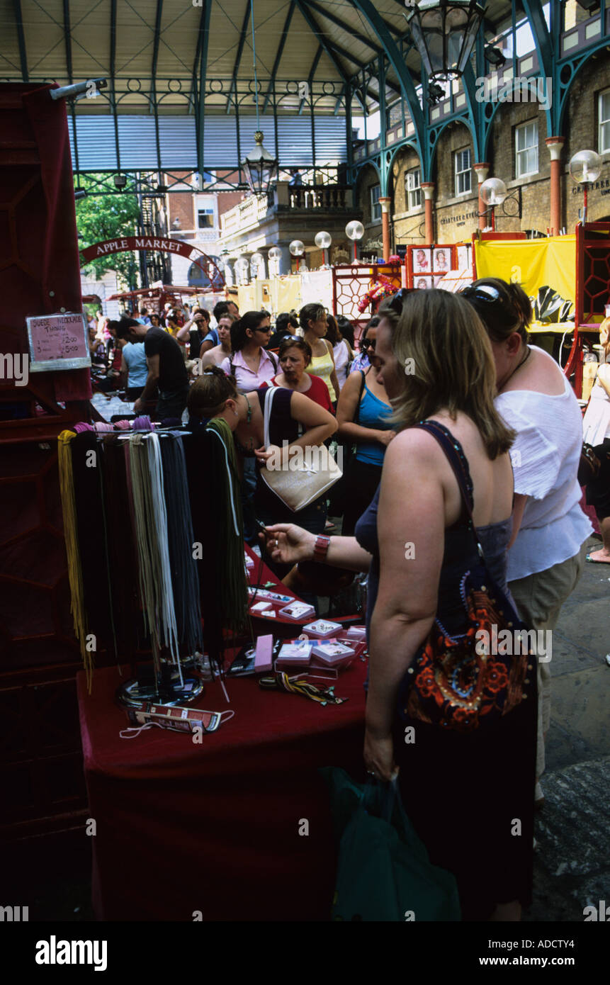 Browsing In Apple Market Covent Garden London Stock Photo