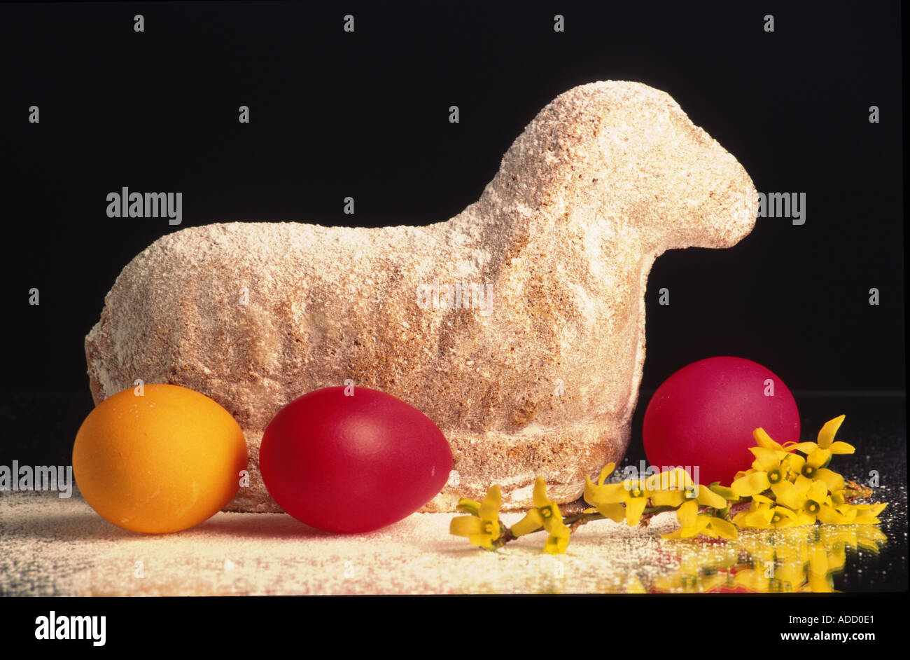 easter lamb cake and colored eggs traditional cake Stock Photo