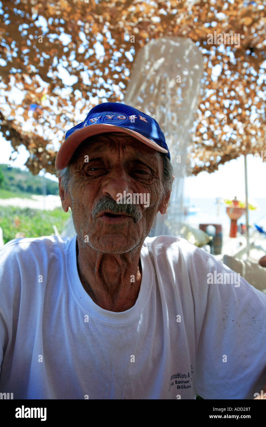 Mykonos Greece local man with fishing hat portrait with old greek hat Stock  Photo - Alamy