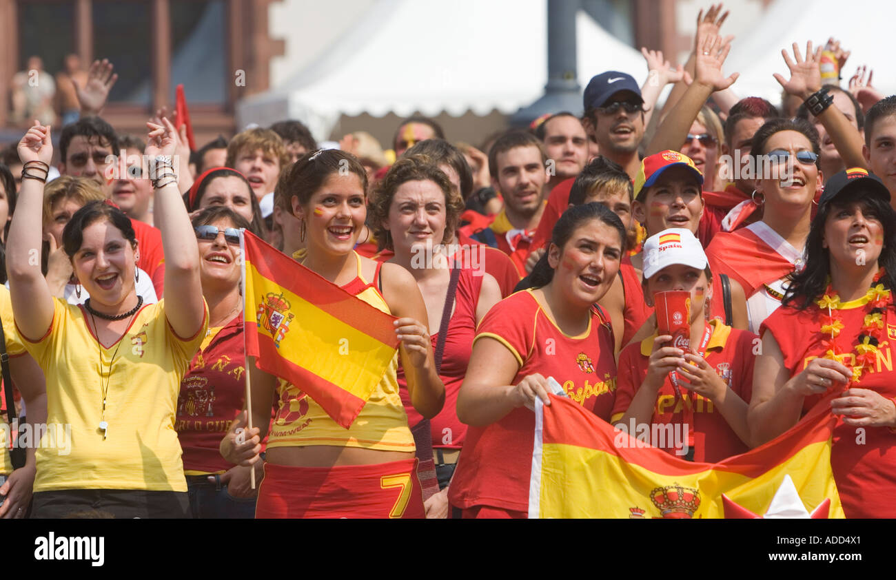 Spanish football fans cheering at a public viewing event Stock Photo