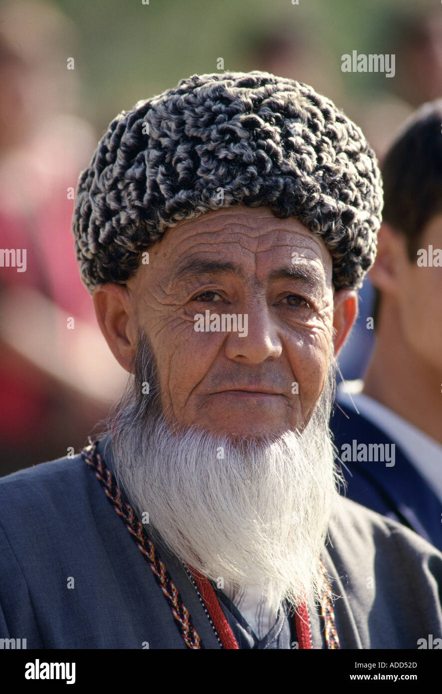 Man in traditional costume and Astrakhan hat in the City of Mary  Turkmenistan Stock Photo - Alamy