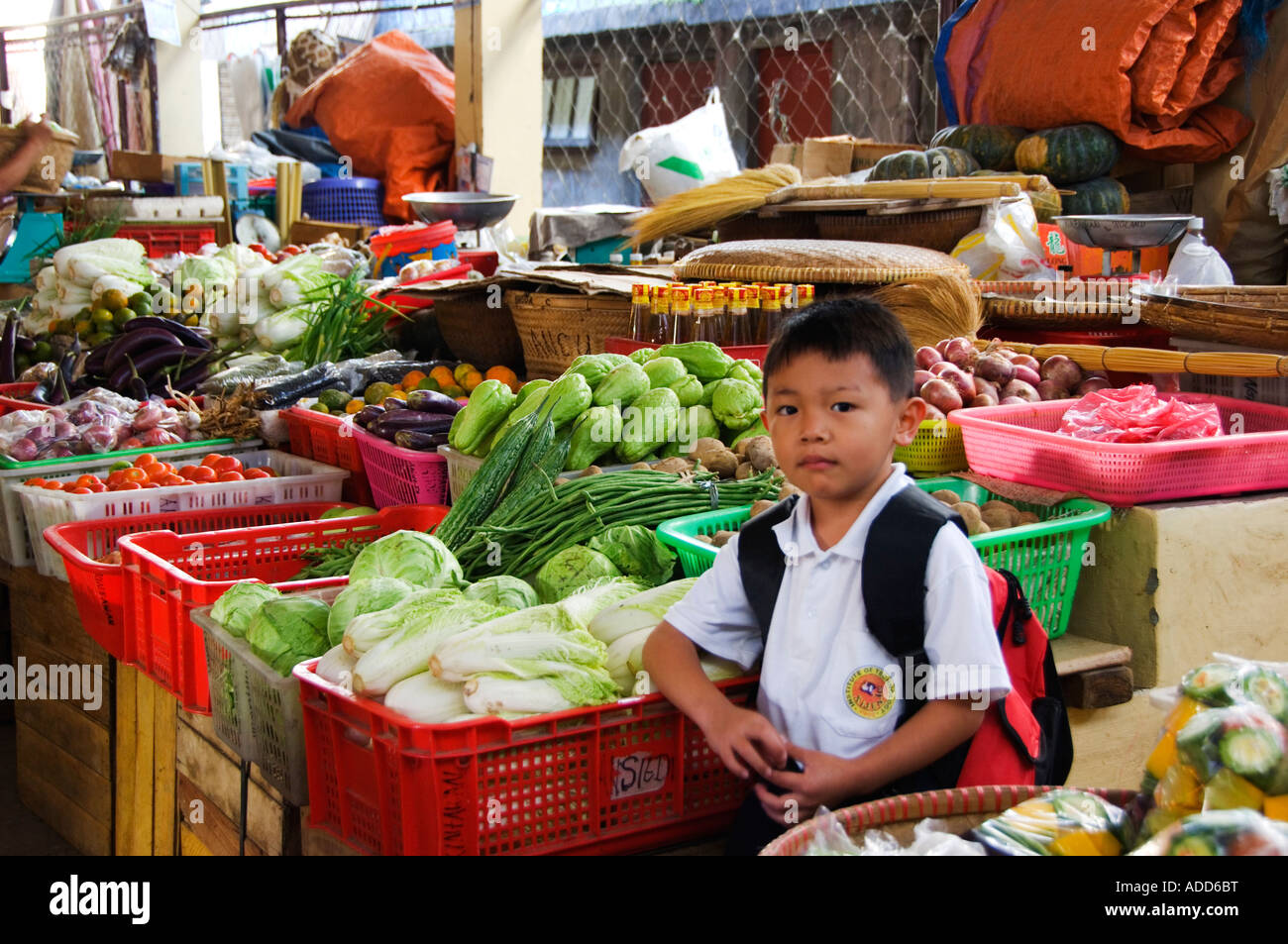 Philippines Luzon Island The Cordillera Mountains Mountain Province Bontoc Food Market and Young Boy near Stand Stock Photo