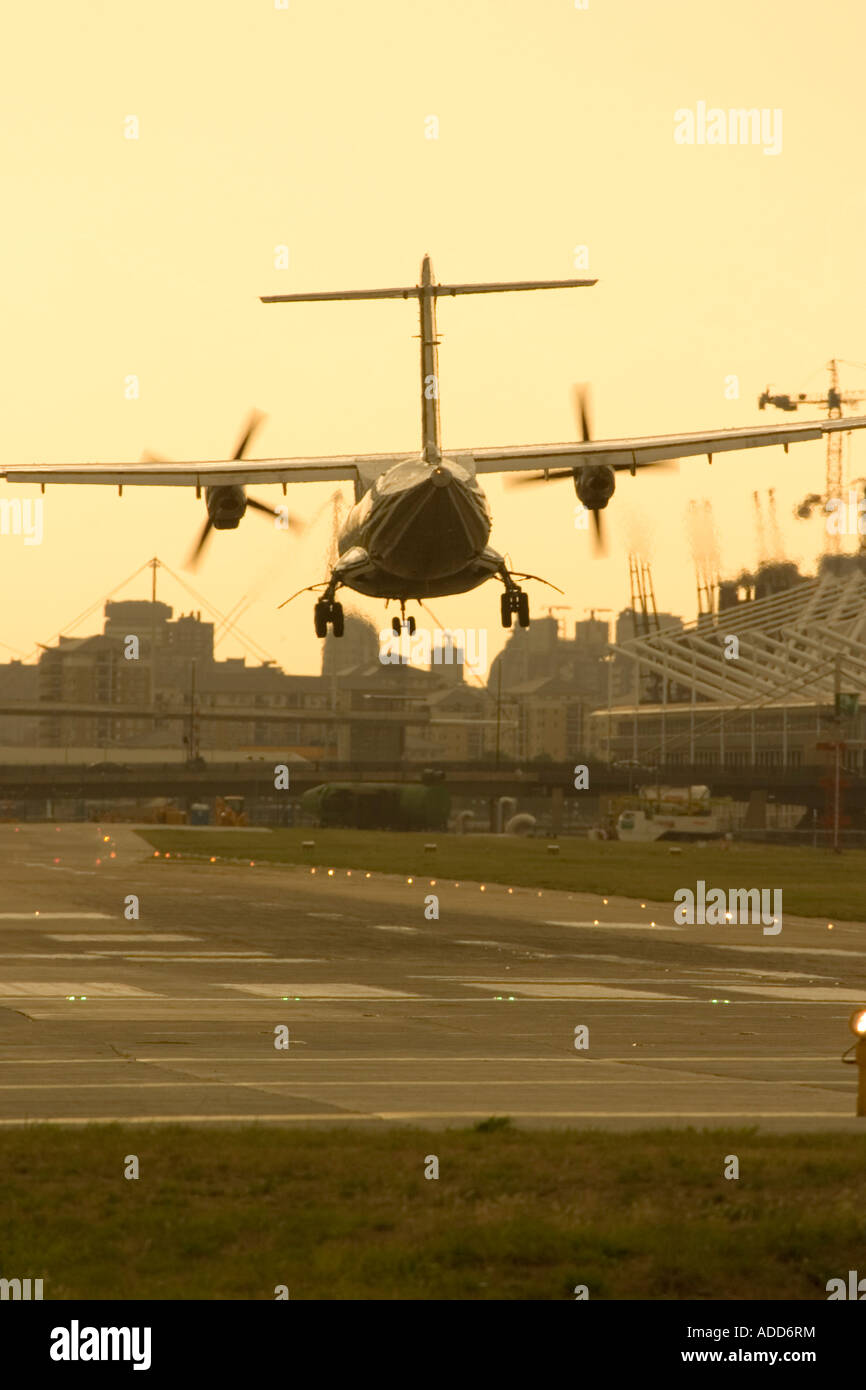 Regional turboprop airliner landing Stock Photo - Alamy