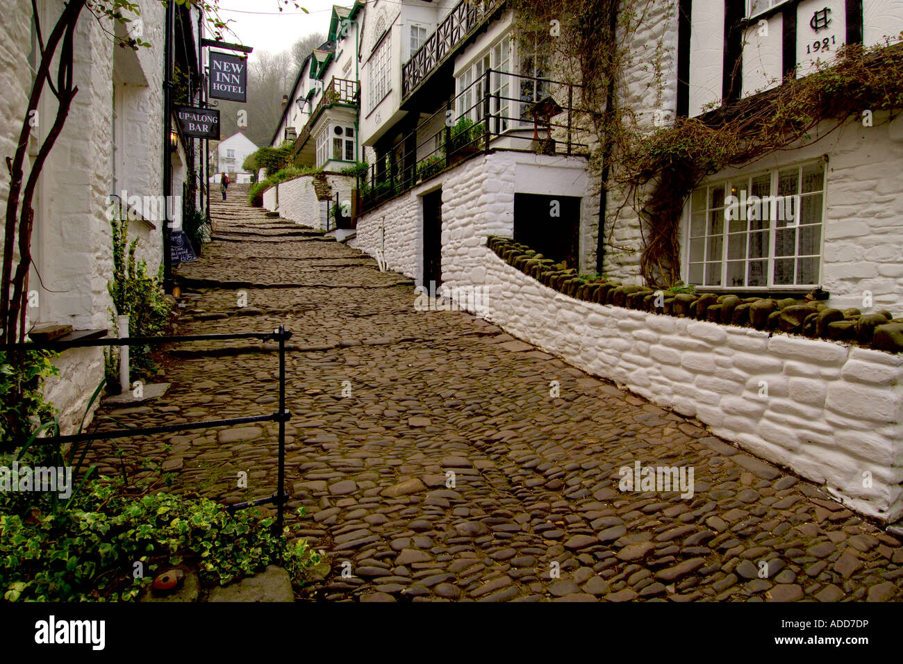 View looking up the main cobbled sreet of the historic fishing village of Clovelly in North Devon Stock Photo