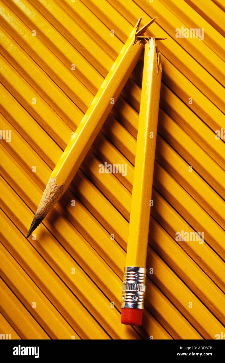 Broken number two pencil resting on top of row of pencils, numerous Stock  Photo - Alamy