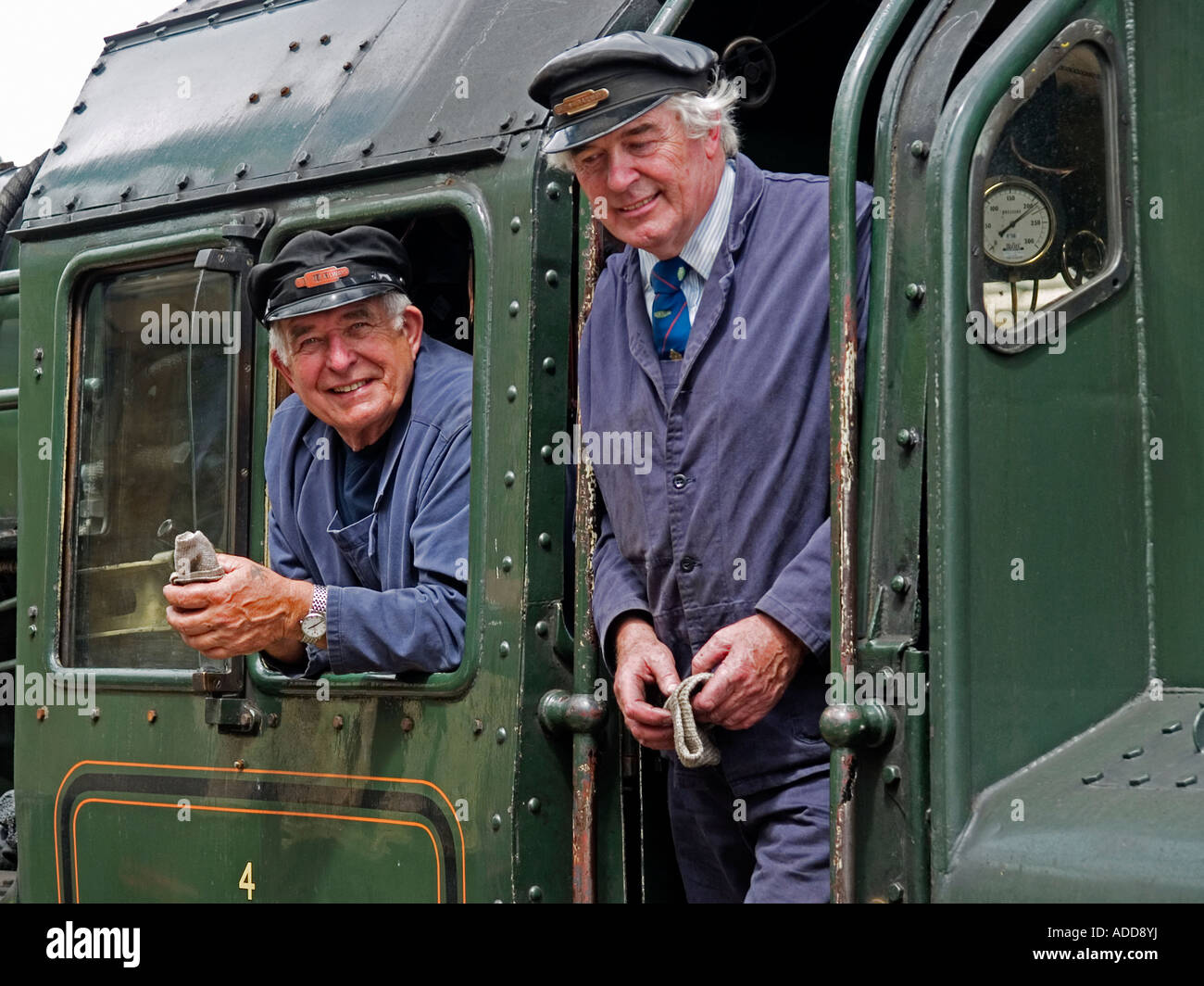 Steam locomotive driver and fireman on a NYMR train at Whitby railway station North Yorkshire July 2007 Stock Photo