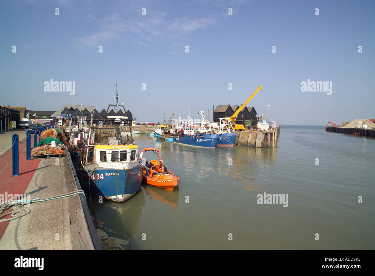 Harbour Whitstable Kent fishing boats and huts Stock Photo - Alamy