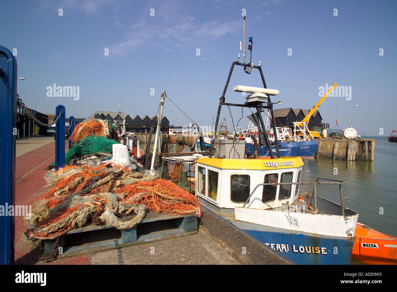Harbour Whitstable Kent fishing boats and huts Stock Photo - Alamy