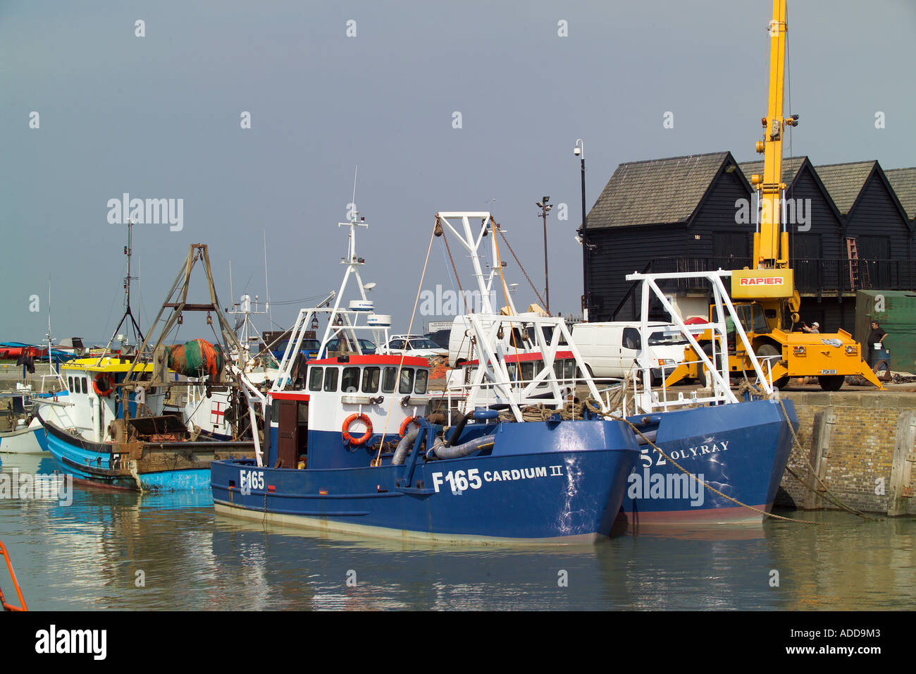 Harbour Whitstable Kent fishing boats and huts Stock Photo - Alamy