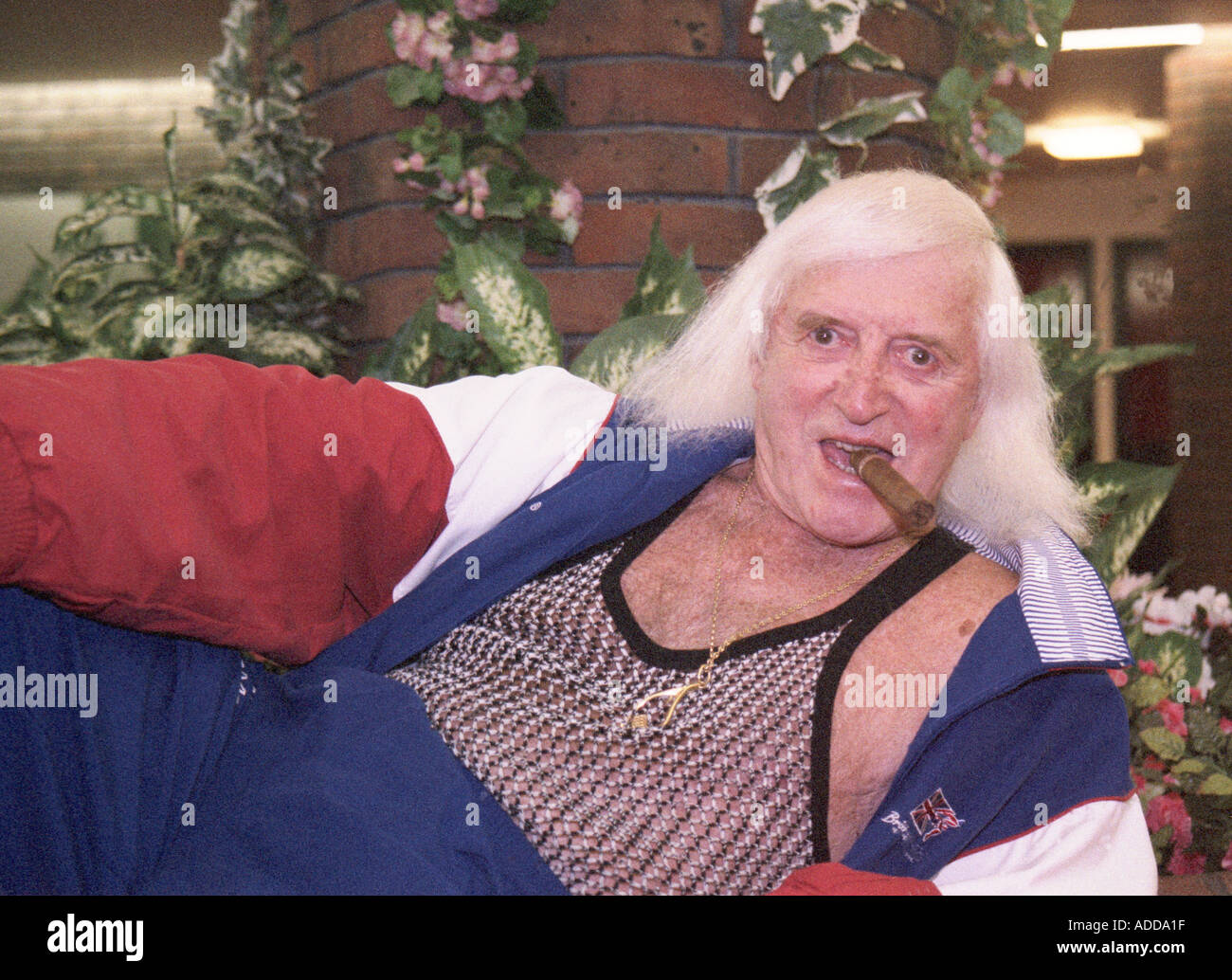 Sir Jimmy Savile at Stoke Mandeville Hospital in Sep 2003 Stock Photo