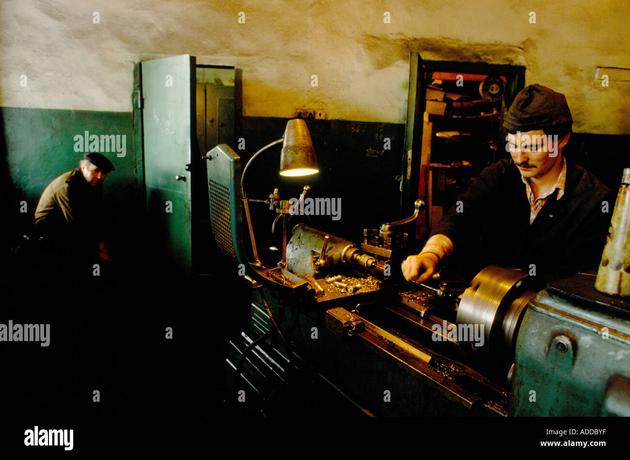 MAN WORKING ON LATHE AT DONETSKE COAL MINE Stock Photo