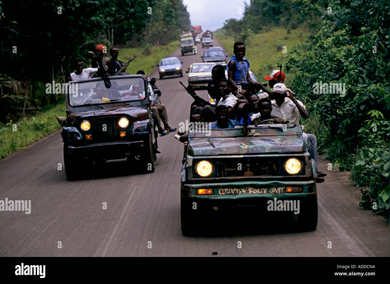 Charles Taylor's Liberia May 96 - Motorcade for Councilman Charles Taylor driving north to a country retreat Stock Photo