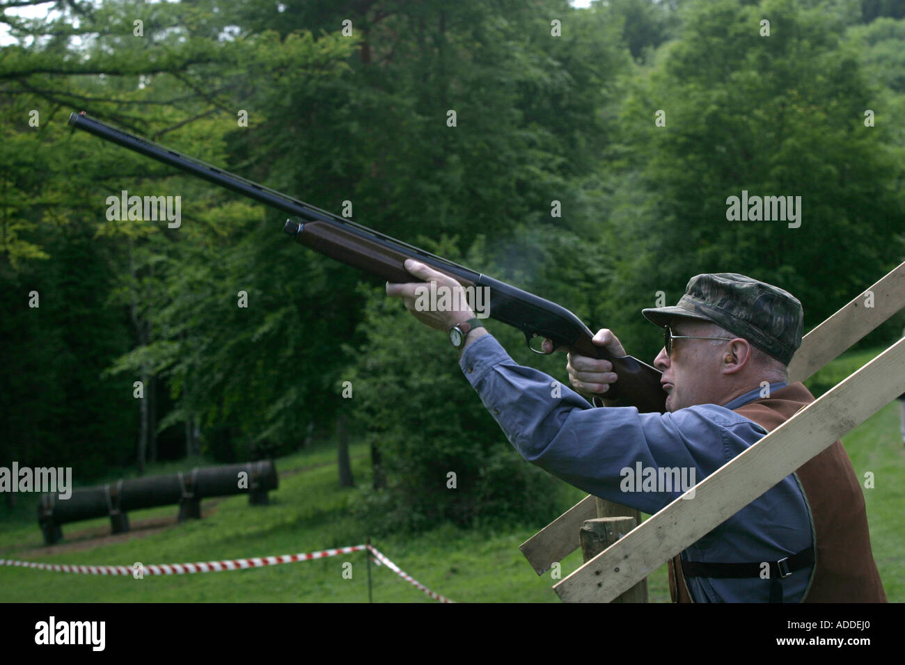 Taking aim with a shotgun. This clay pigeon shoot was organised by the Hambleden Estate to thank