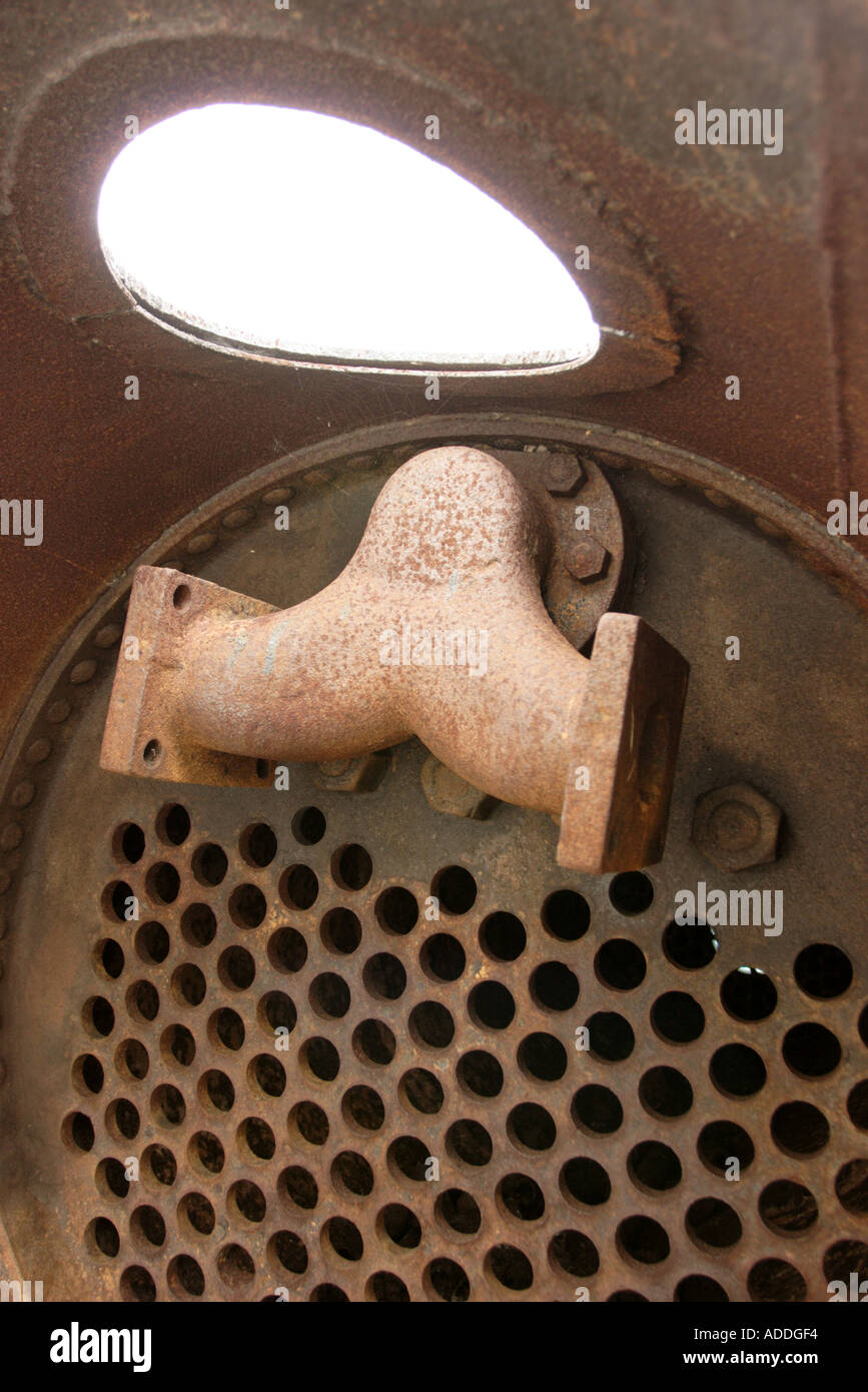 Inside rusty old boiler of steam engine Stock Photo