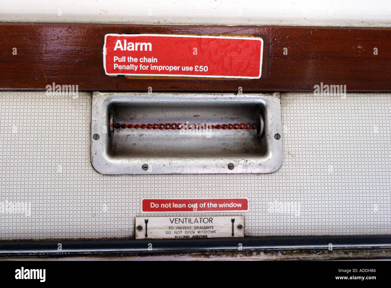 Emergency stop chain in railway carriage Stock Photo Alamy