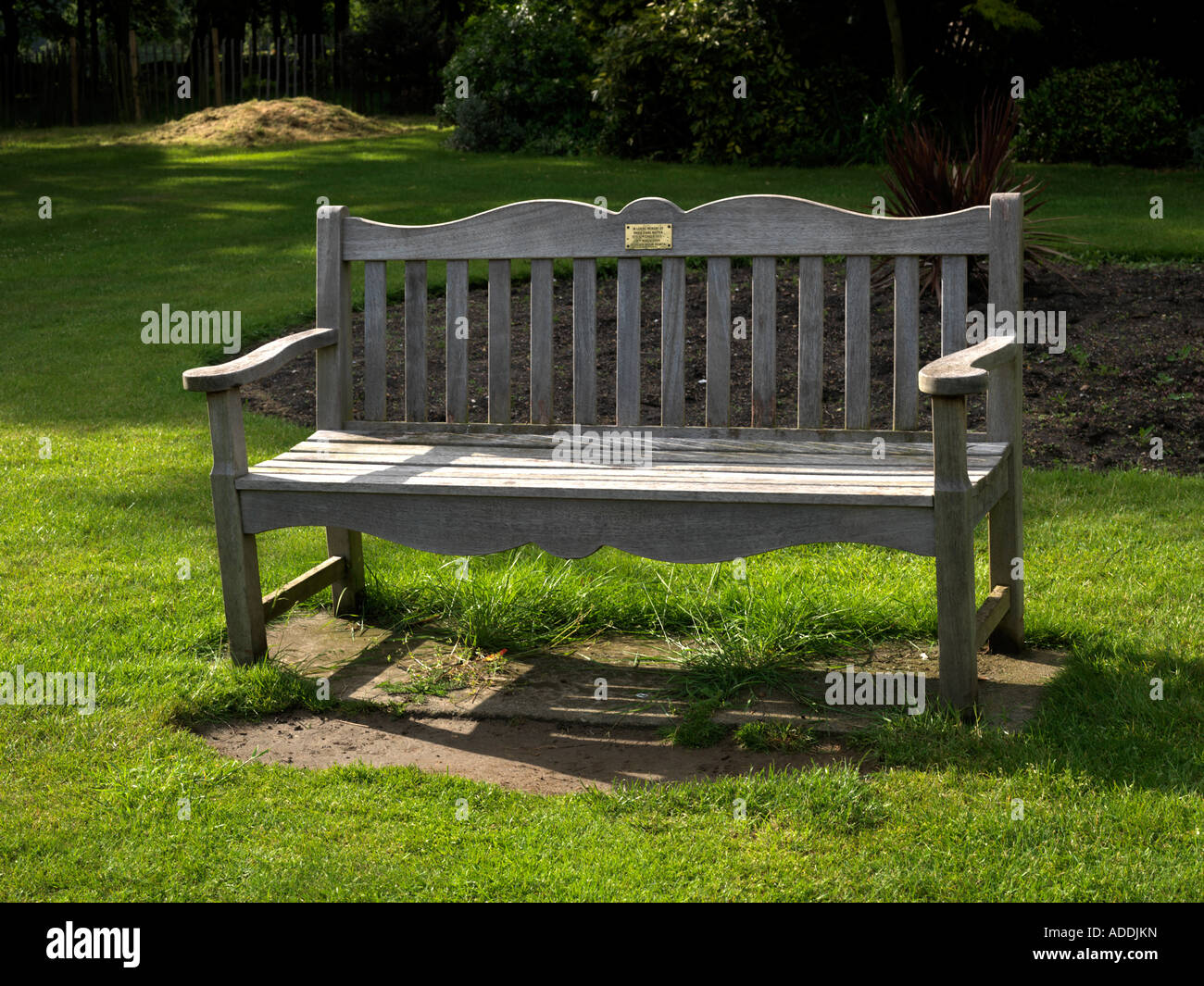 Memorial Bench in Mansion House Gardens Nonsuch Park Cheam Surrey Stock