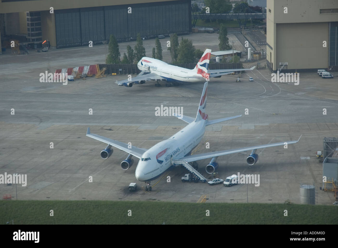 Two British Airways jets parked at Heathrow International Airport in London Stock Photo