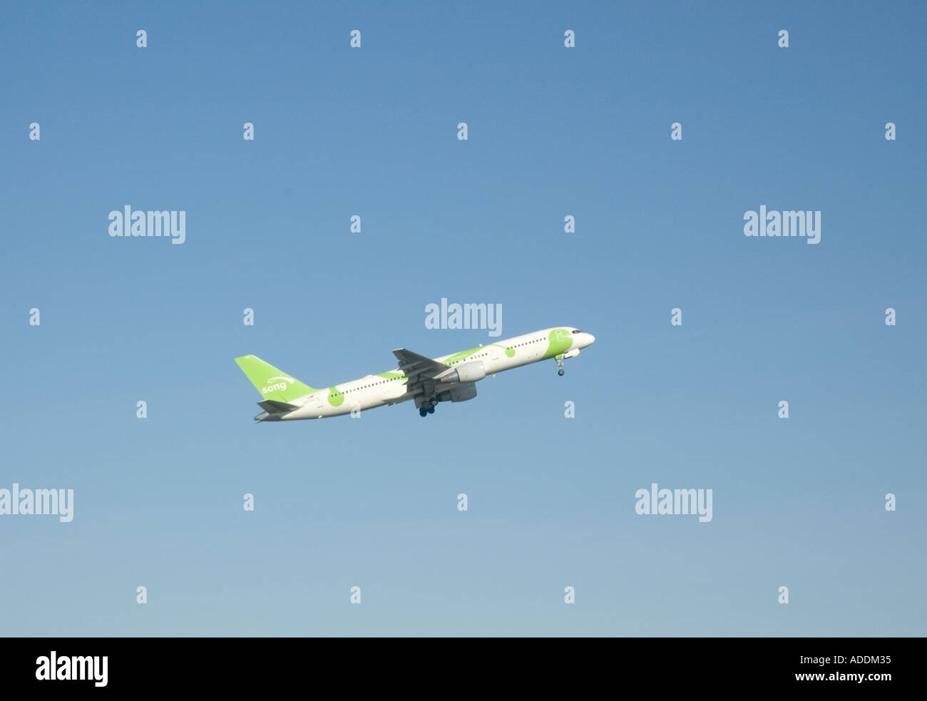 A Song Airlines passenger jet during takeoff Stock Photo
