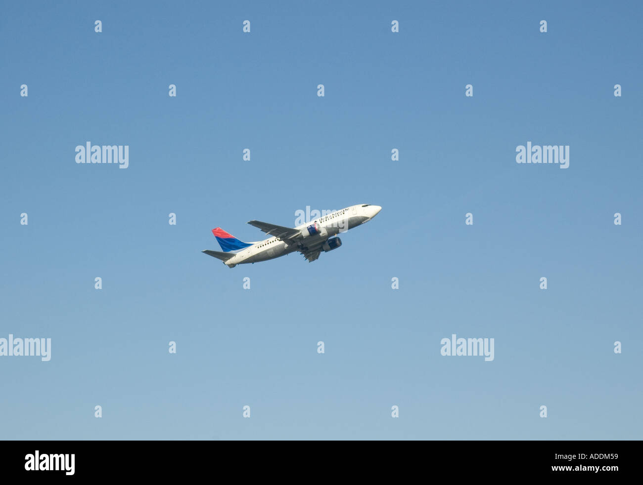 A Delta Shuttle passenger jet during take off from Logan International Airport in Boston Massachusetts Stock Photo
