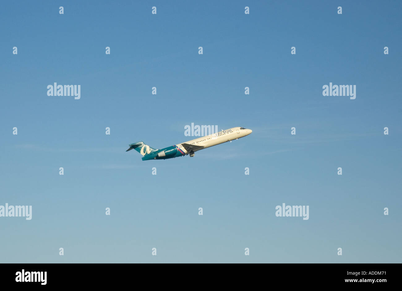 An Airtran passenger jet taking off from Logan International Airport Boston Massachusetts Stock Photo