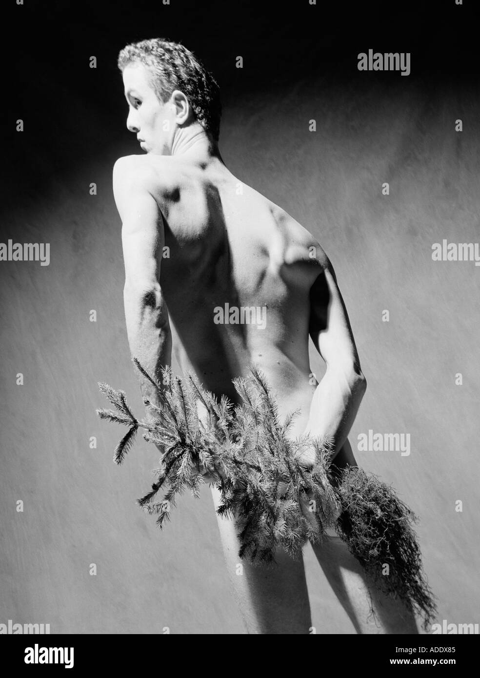 naked man with Christmas tree Stock Photo - Alamy