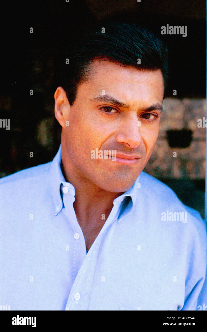 Serious hispanic male wearing hi-res stock photography and images - Alamy