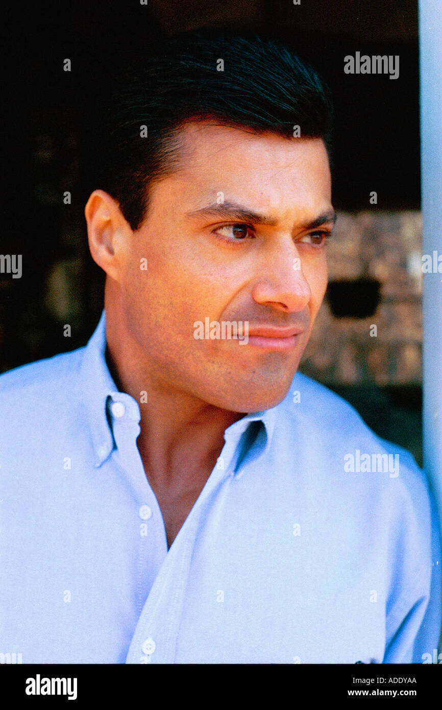Outdoor Portrait of Man of Hispanic Heritage Wearing a Blue Shirt Stock ...