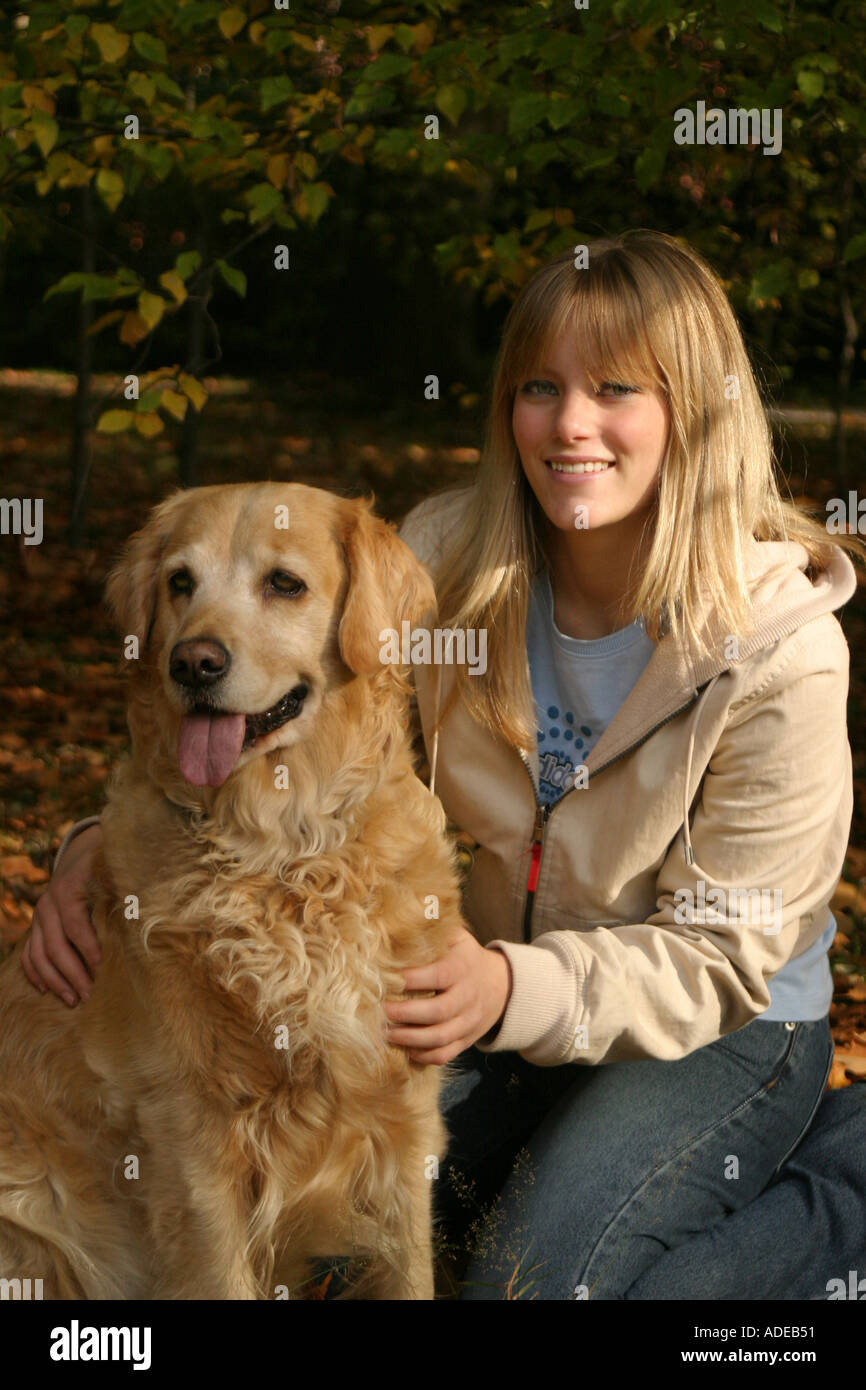 Young teenage girl 16 with Golden Retriever Stock Photo - Alamy