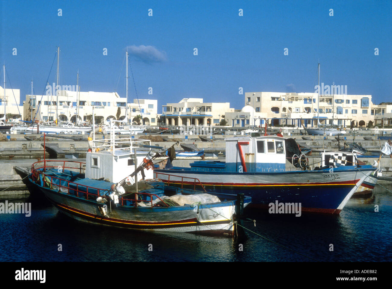 Motor fishing vessels at the harbour at Port El Kantaoui near Sousse in Tunisia North Africa Stock Photo