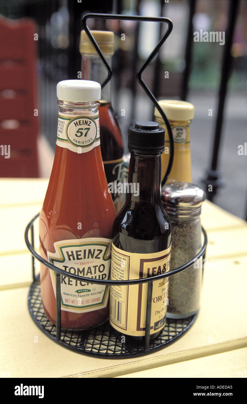 Condiments on the table of a restaurant in the US Stock Photo