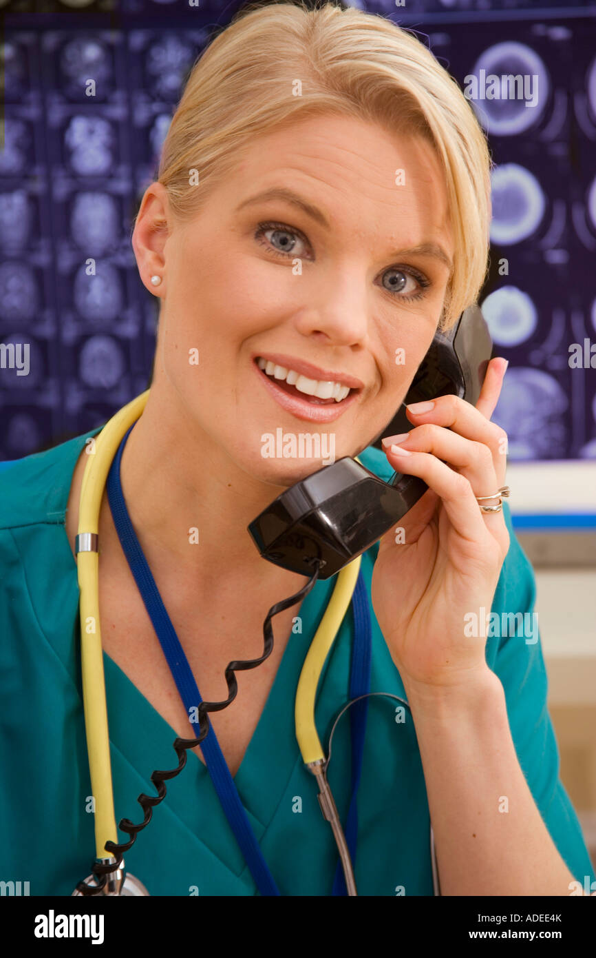 Nurse uses telephone. Stock Photo