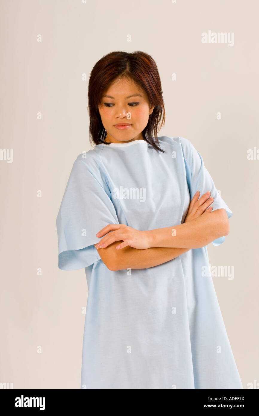 Woman in her 30s waits for her healthcare professional Stock Photo Alamy