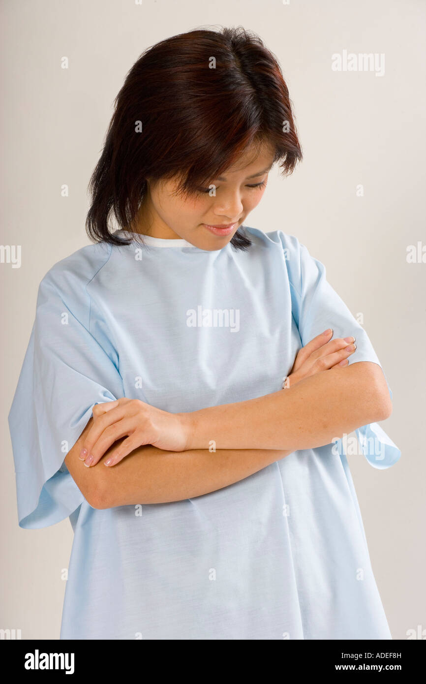 Woman waiting for her exam... or she is waiting for her diagnosis. Stock Photo