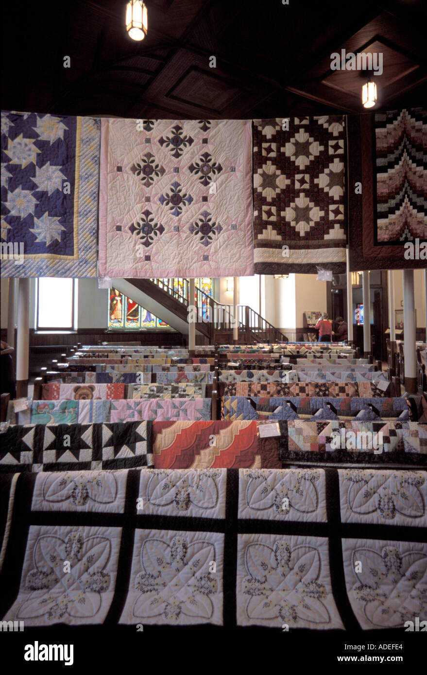Quilts hung in a United Church of England in New Brunswick Canada Stock Photo