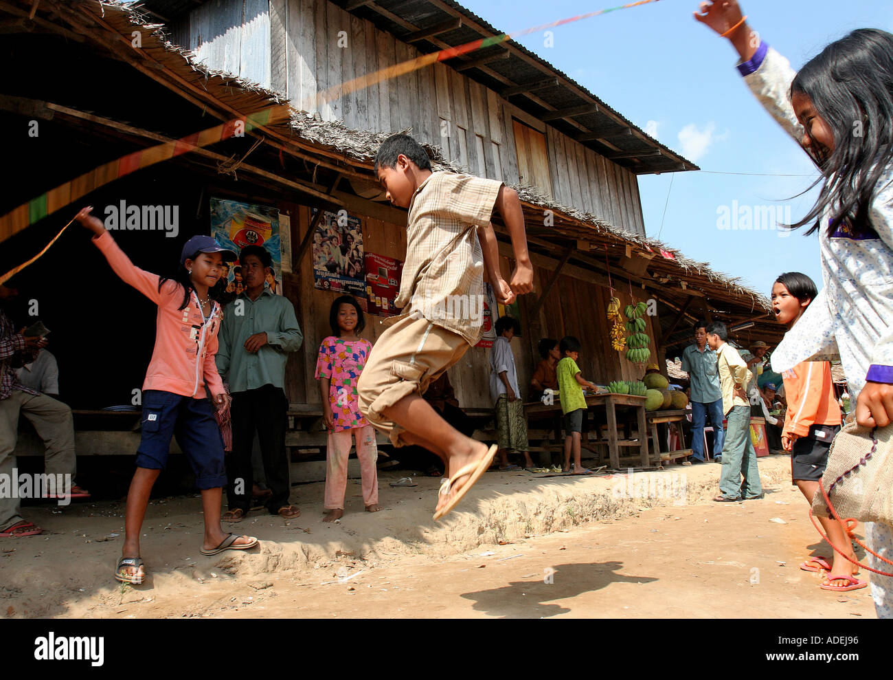 Children play jumprope at Andon Thuk in cambodia Stock Photo