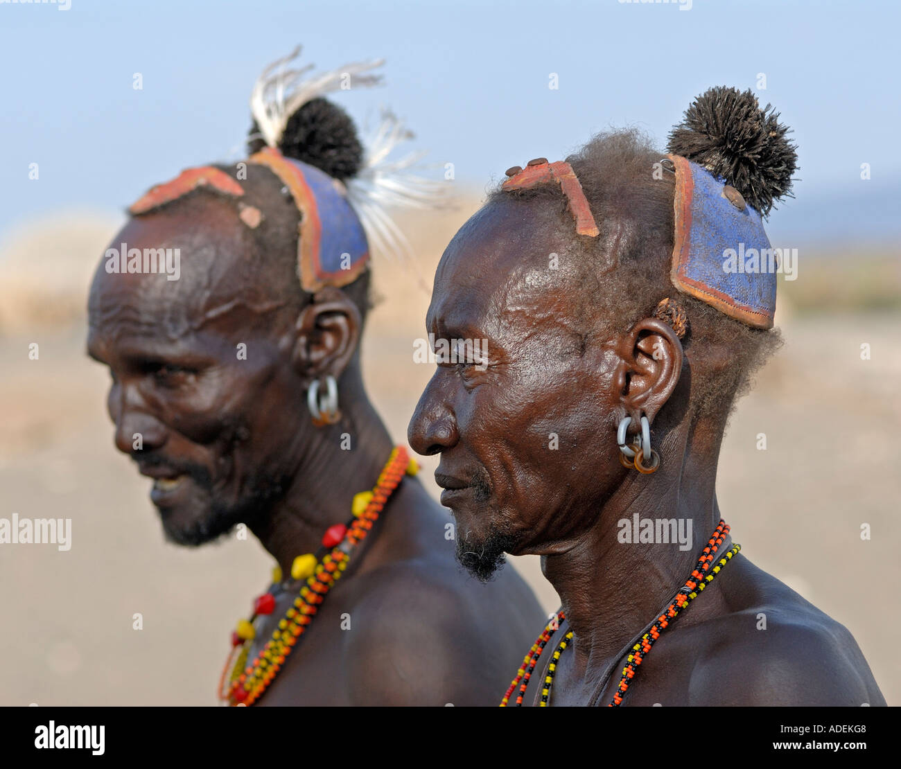 Turkana medicine men wearing clay hairdo and genuine tribal decorations  Kula Samaki Northern Kenya Stock Photo - Alamy