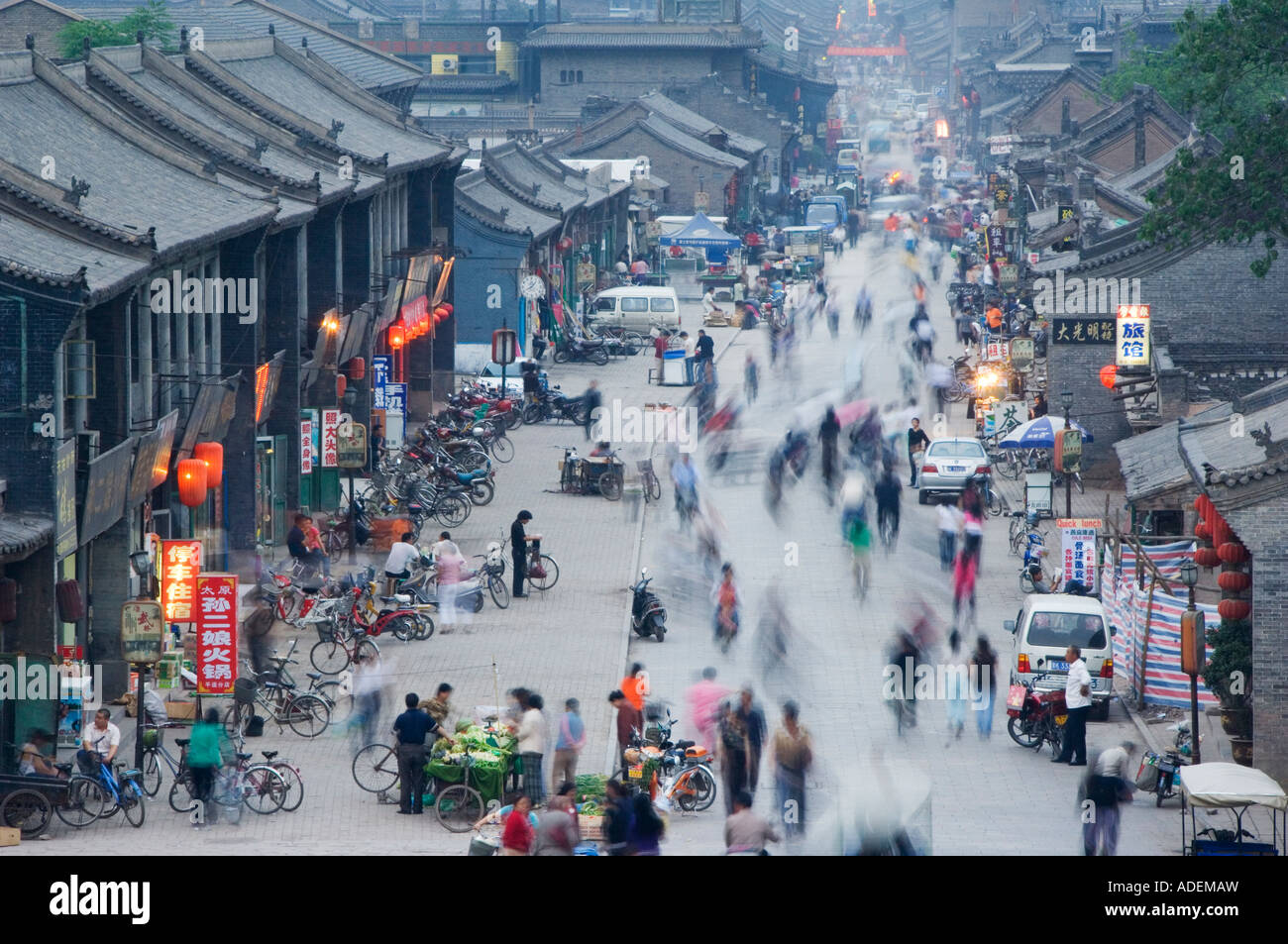 people in the historic old town Unesco World Heritage Site Pingyao City ...