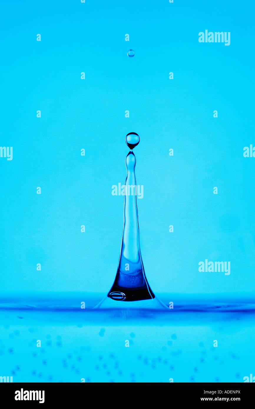 WATER DROPLET SPLASHING INTO WATER Stock Photo - Alamy