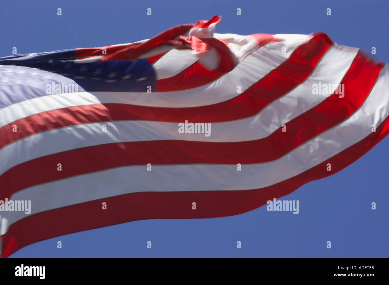 USAflag waving in sky Stock Photo - Alamy